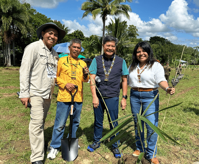 Kilambay Plantation Corp. executives strike a pose during the historic bamboo planting Guiness World record attempt