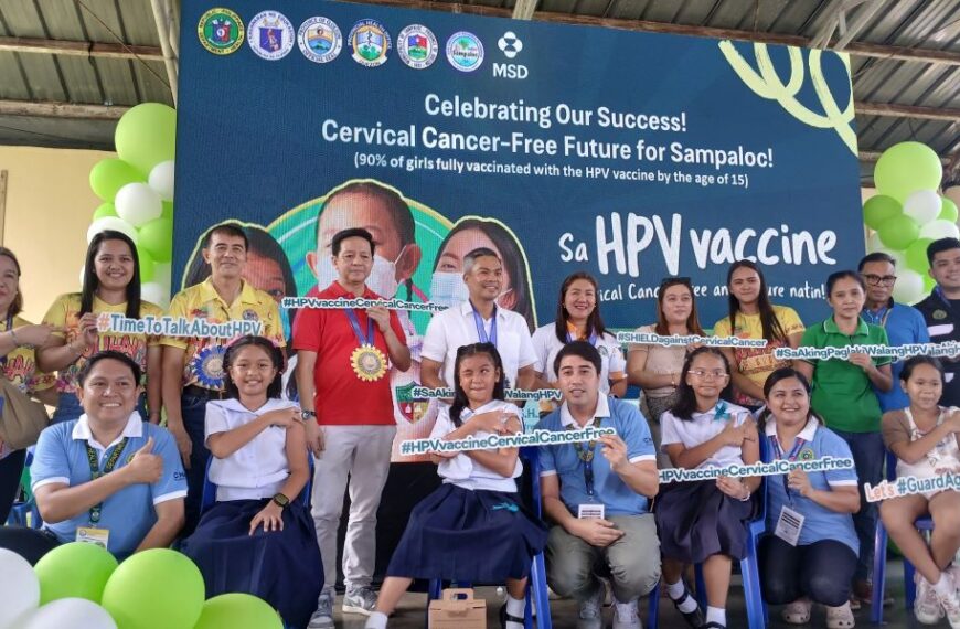 Sampaloc Mayor Devanadera with the school children and DOH nurses during HPV vaccination