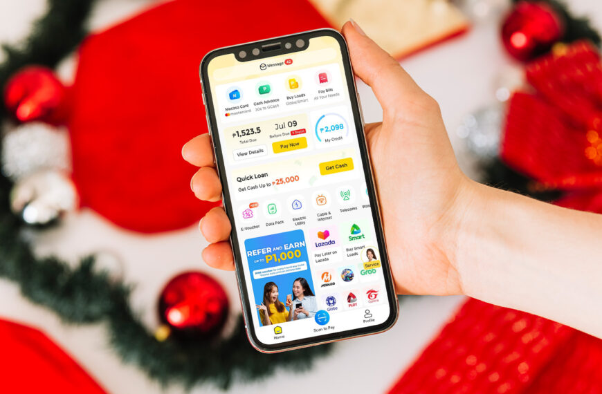 Mocasa offers tips to help you make the most of your 13th month pay, as shown in this photo of a mobile phone with the Mocasa app amidst a holiday backdrop