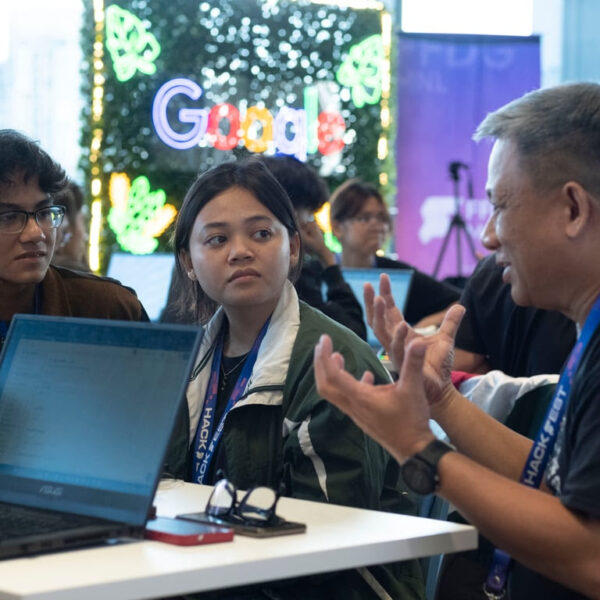 FlutterFlow HackFest contestants getting a few pointers from the event's organizer