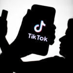 Caricature showing the word 'TikTok' and a man holding a mobile phone