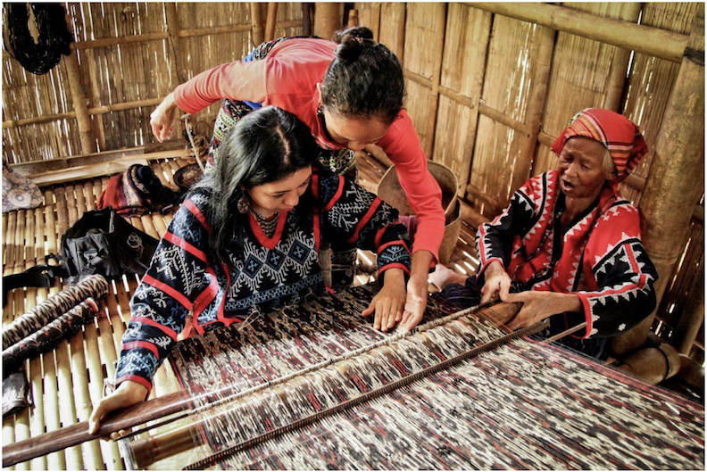 Community-led tourism in PH revives indigenous cultures like this photo of a family weaving together