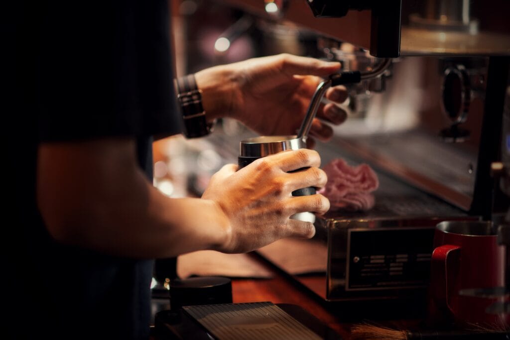 A barista showing how specialty coffee shops are redefining community and culture in PH