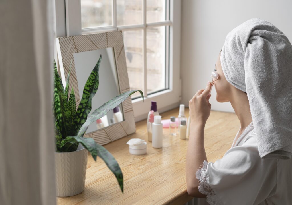 Woman doing a self skincare routine at home
